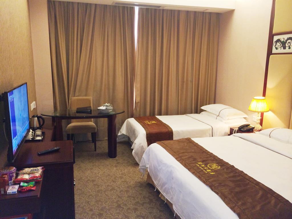 Long Zhou Grand Hotel Guangzhou Ruang foto