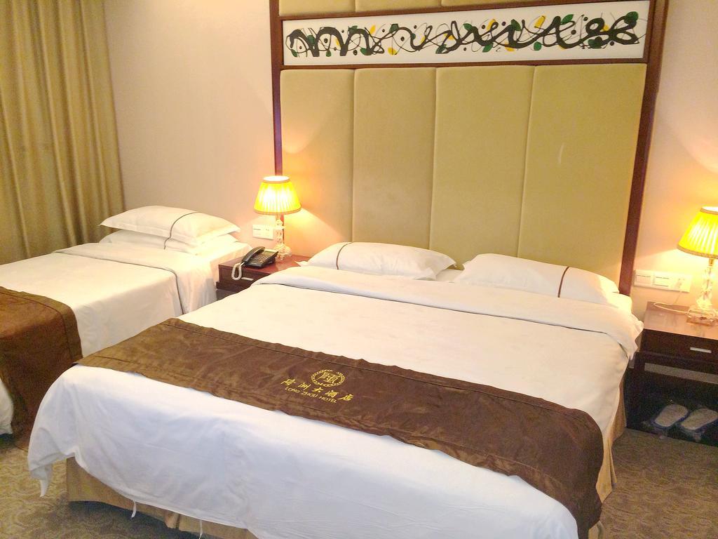 Long Zhou Grand Hotel Guangzhou Ruang foto