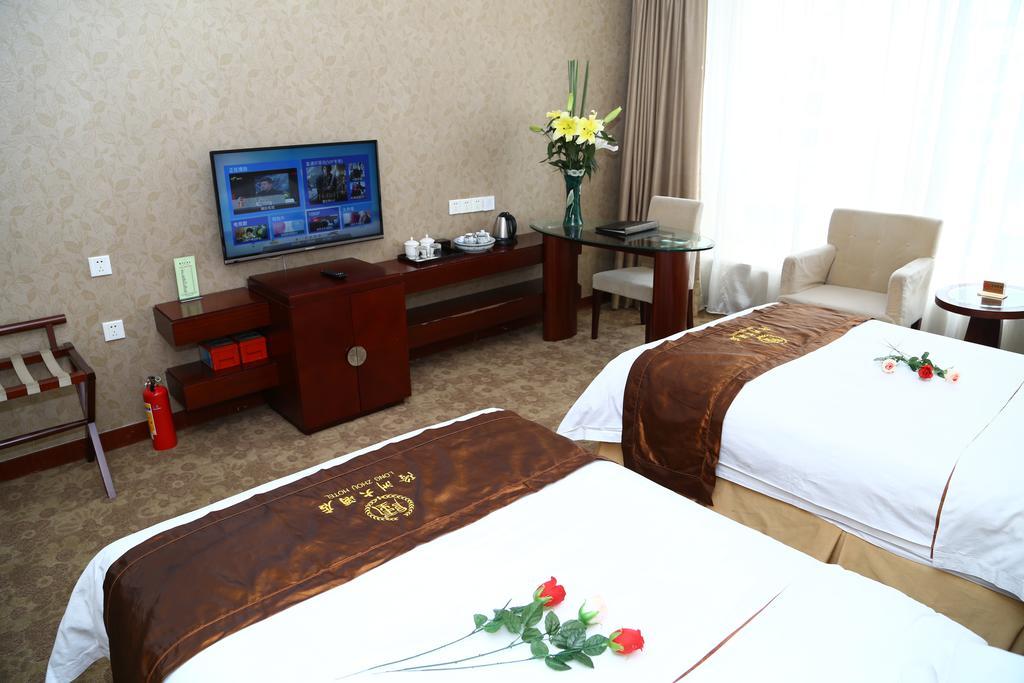 Long Zhou Grand Hotel Guangzhou Ruang foto