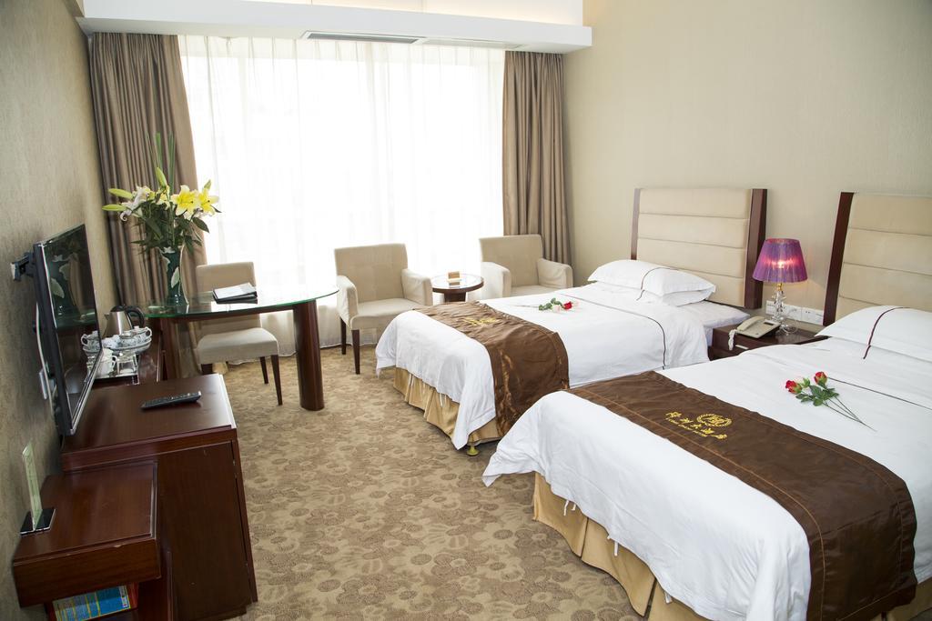 Long Zhou Grand Hotel Guangzhou Ruang foto
